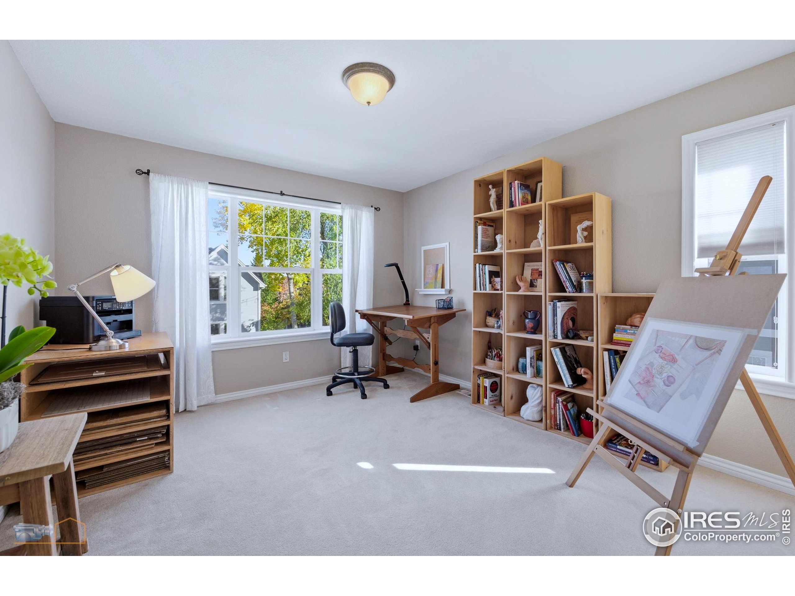 4921 Fountain Street Boulder, CO 80304 - Photo 31 of 50 a living room with furniture and a window