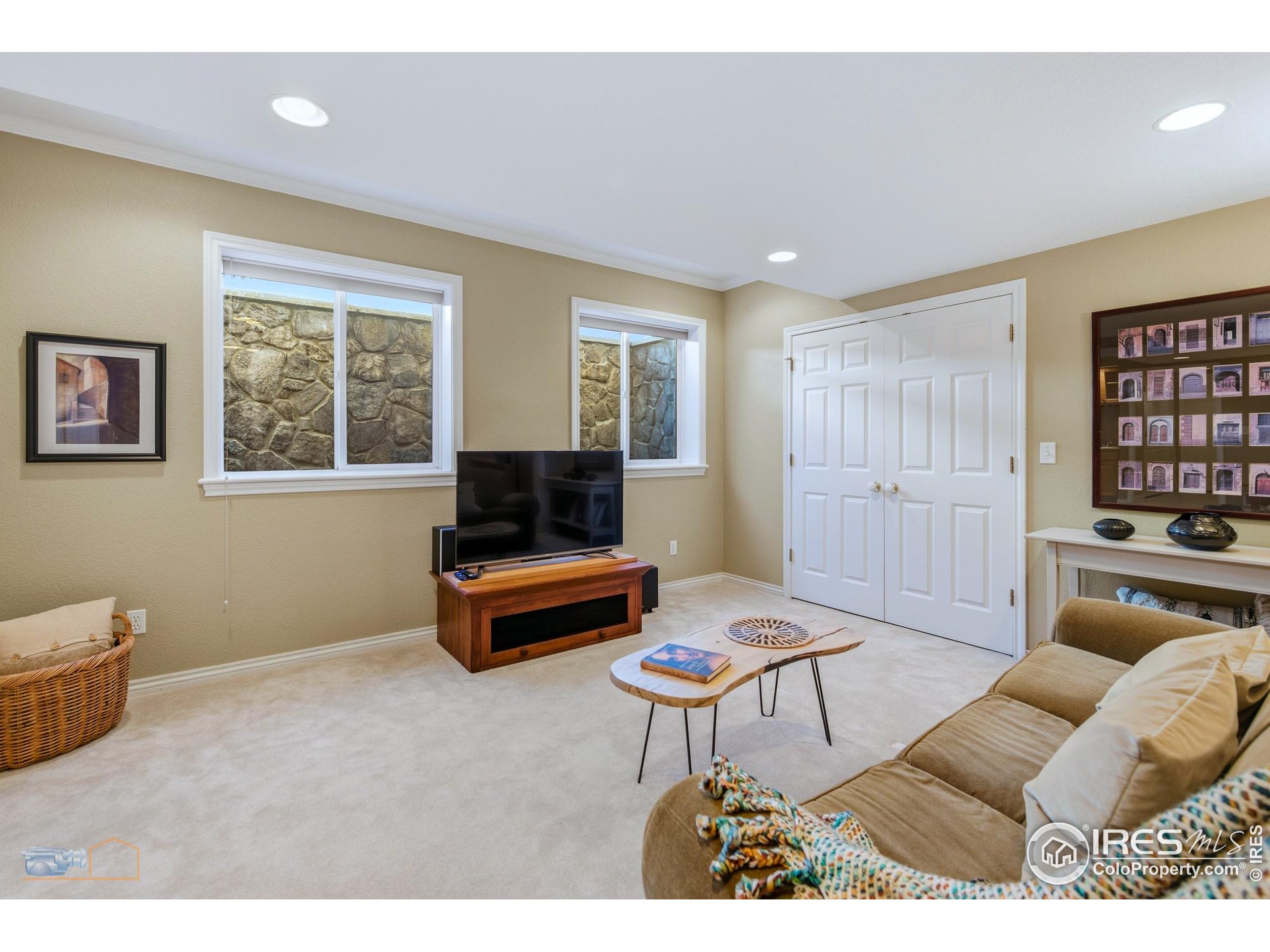 4921 Fountain Street Boulder, CO 80304 - Photo 33 of 50 a living room with furniture a rug and a window