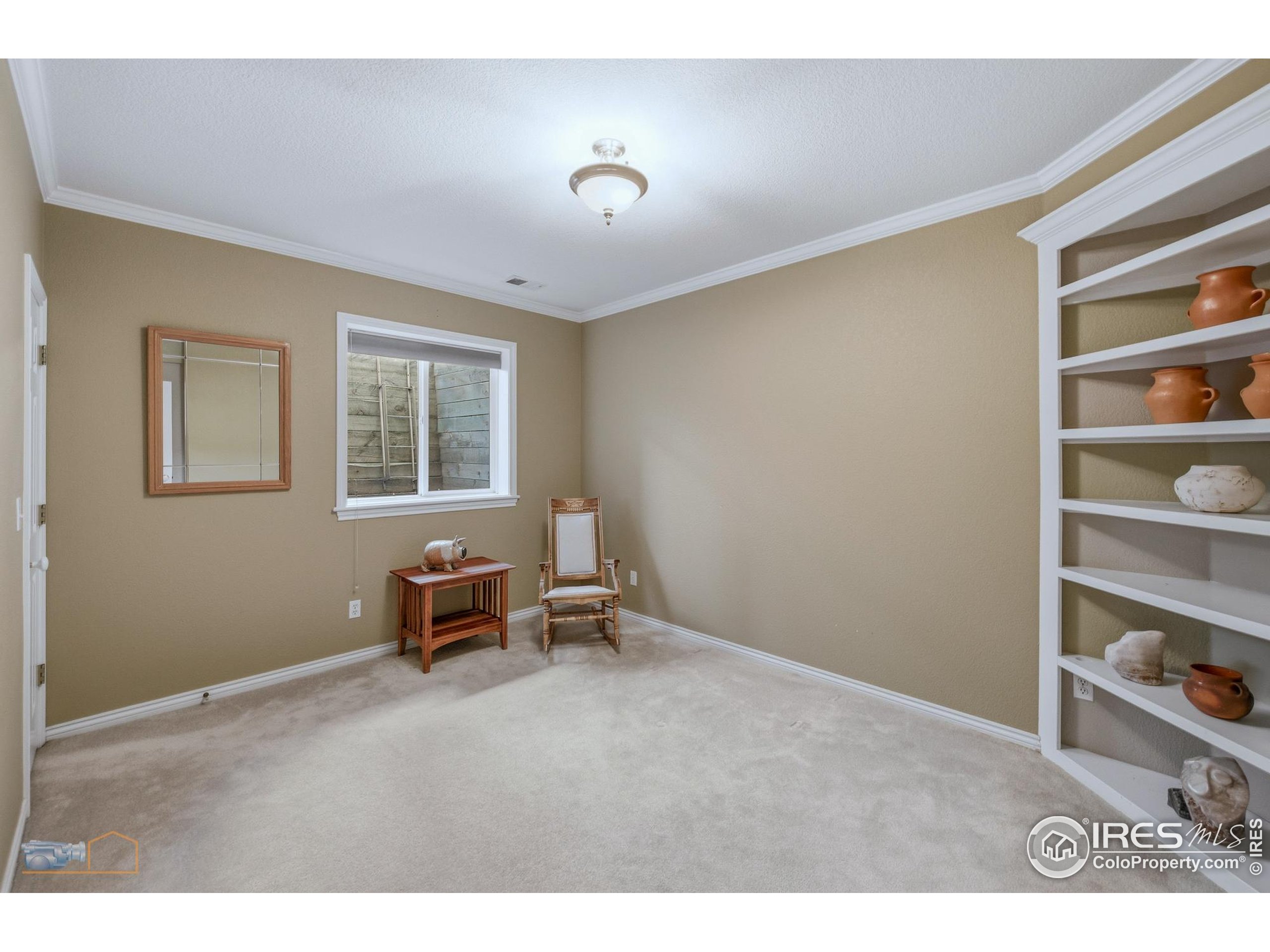 4921 Fountain Street Boulder, CO 80304 - Photo 35 of 50 a living room with furniture and a window