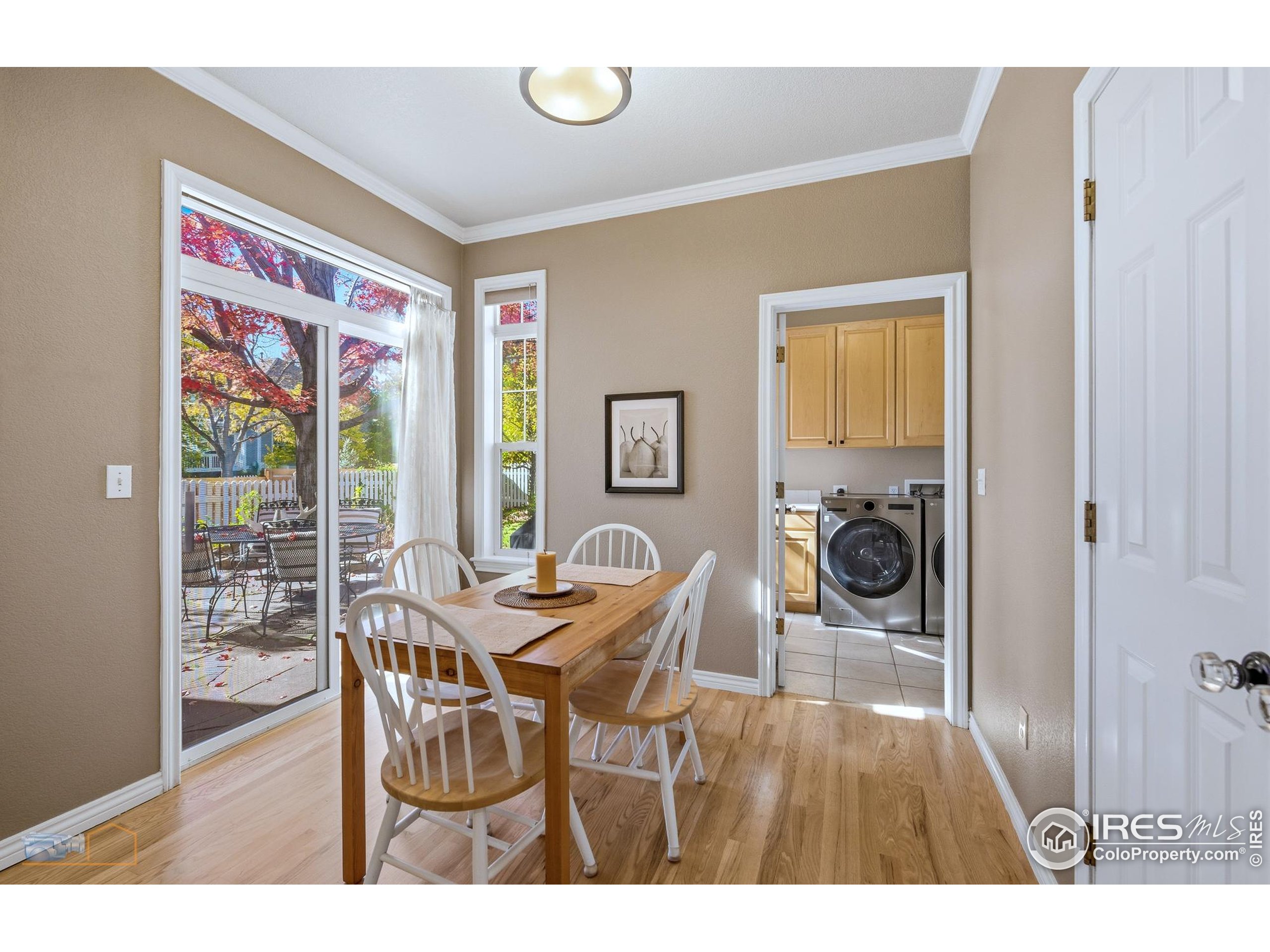4921 Fountain Street Boulder, CO 80304 - Photo 8 of 50 a view of a dining room with furniture and a floor to ceiling window