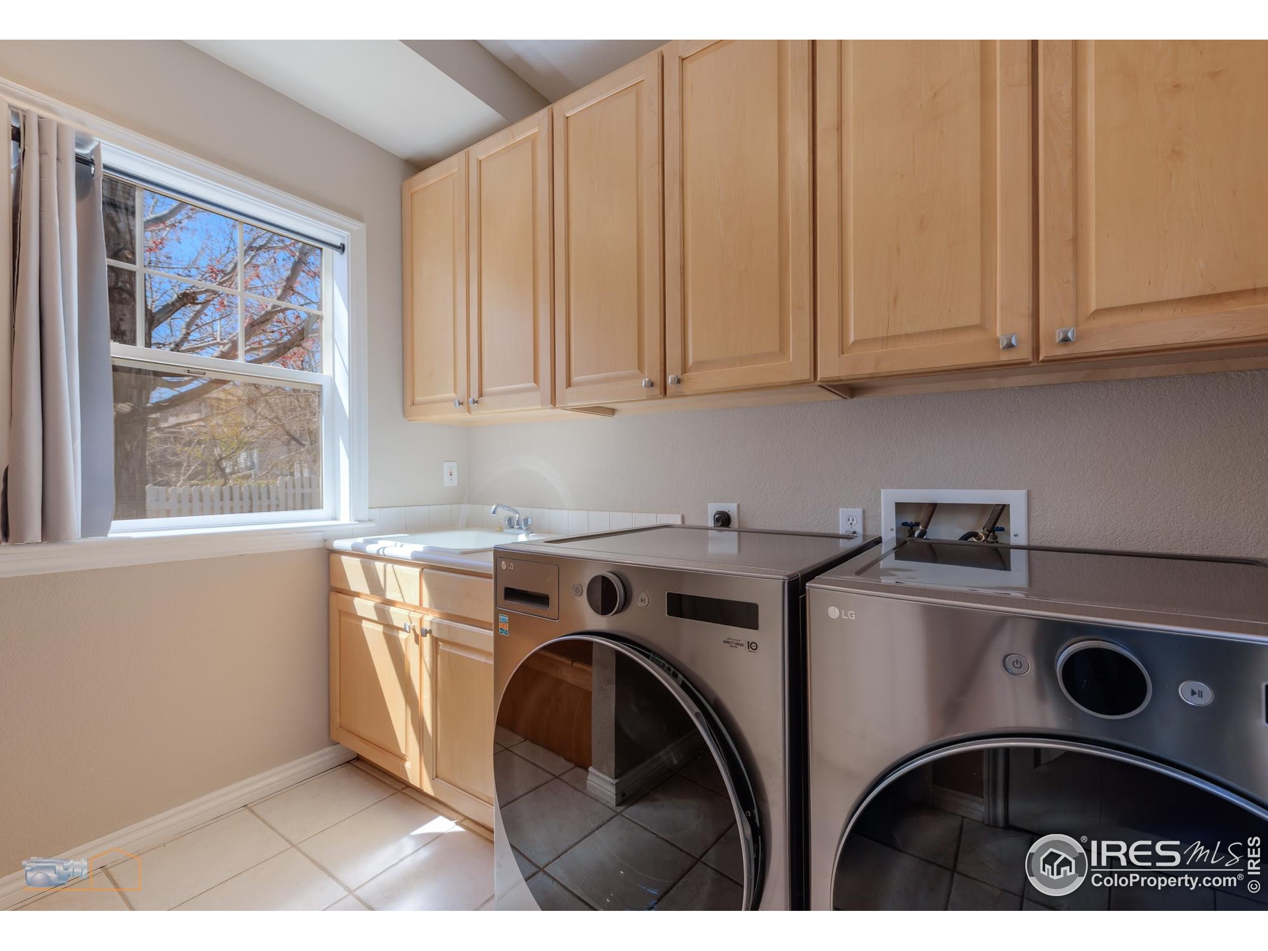 4921 Fountain Street Boulder, CO 80304 - Photo 9 of 50 a utility room with dryer and washer