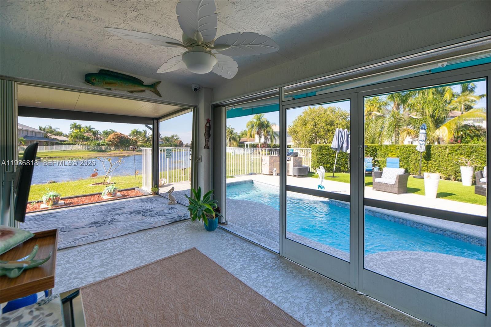 1409 Majesty Terrace Weston, FL 33327 - Photo 43 of 61 Overed screen in area