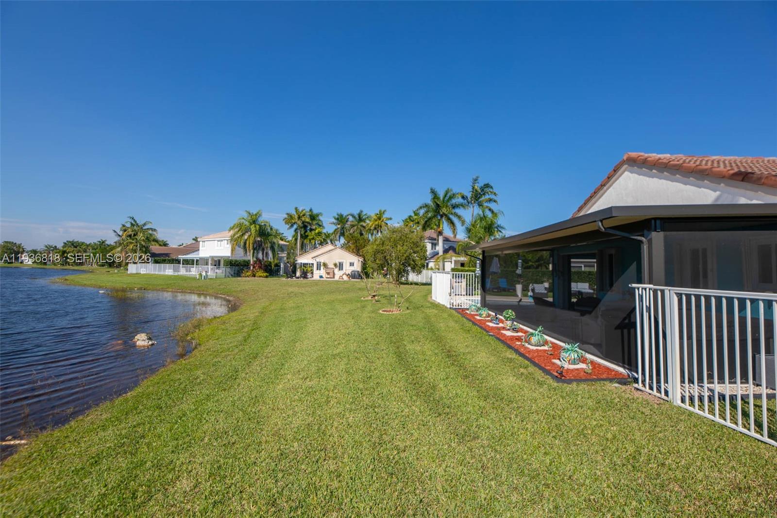 1409 Majesty Terrace Weston, FL 33327 - Photo 49 of 61 Peaceful lake view