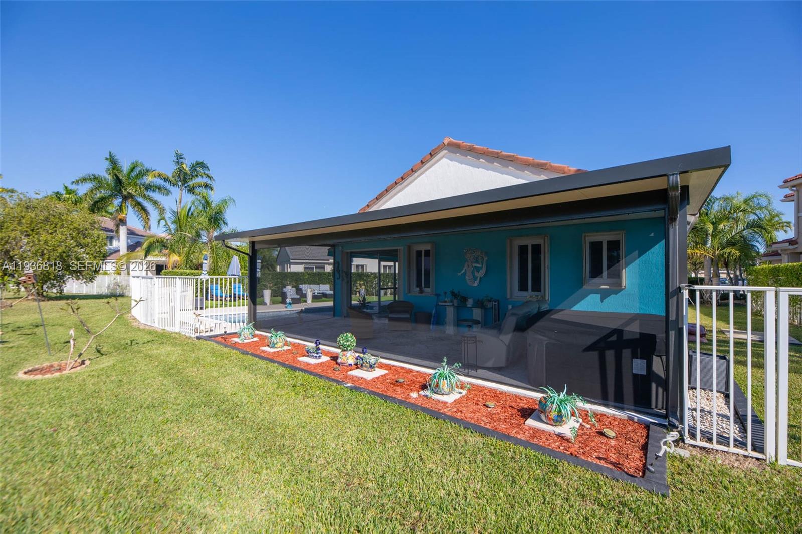 1409 Majesty Terrace Weston, FL 33327 - Photo 50 of 61 Large screened in patio area with Jacuzzi