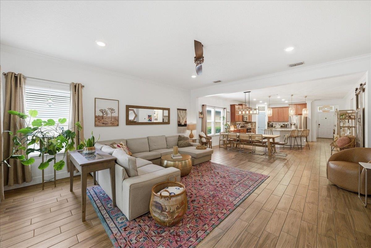 110 Ceja Way St. Augustine, FL 32095 - Photo 12 of 78 a living room with furniture and a wooden floor