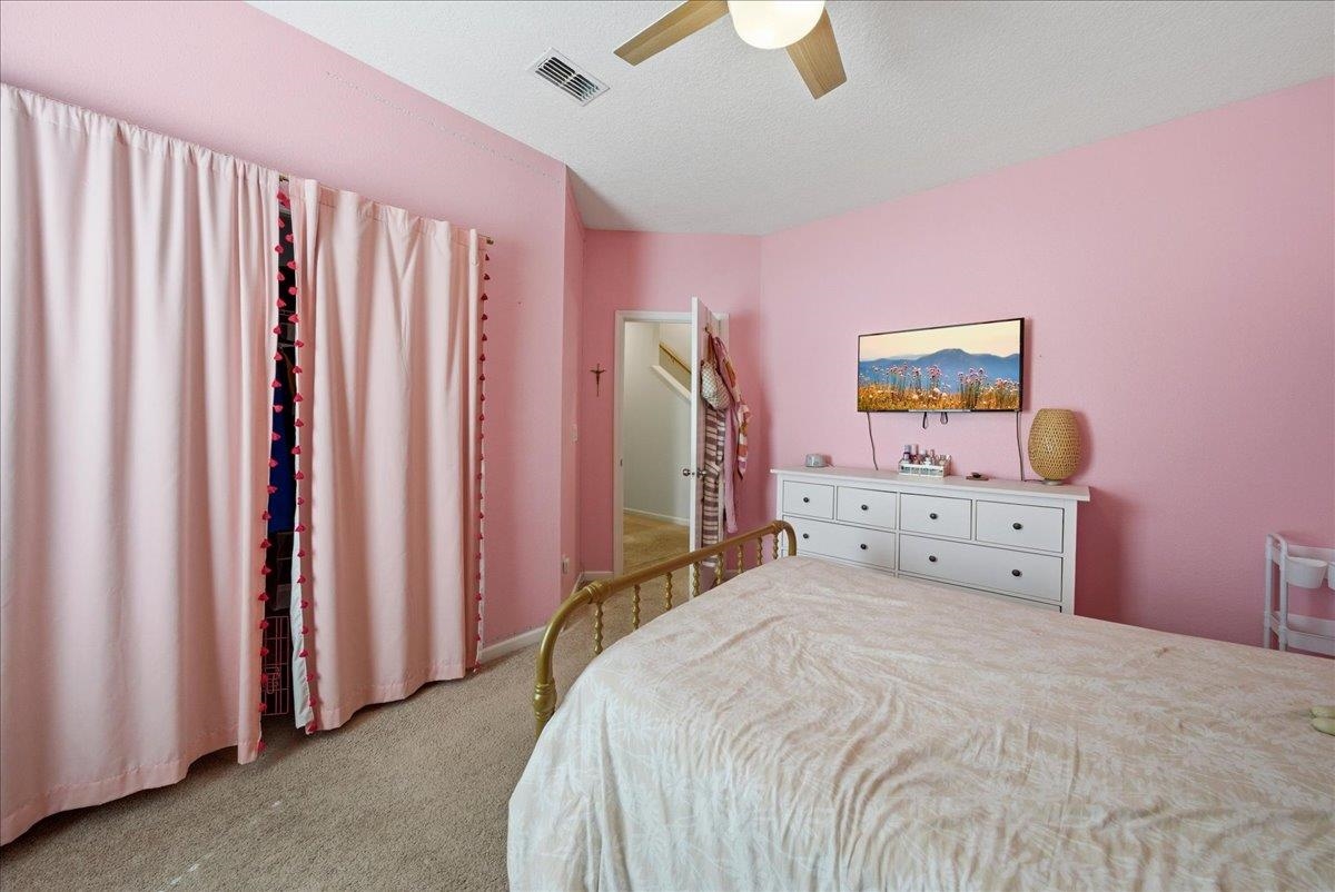 110 Ceja Way St. Augustine, FL 32095 - Photo 20 of 78 a bedroom with a bed and a window