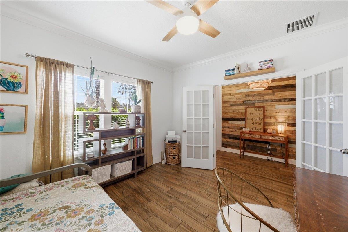 110 Ceja Way St. Augustine, FL 32095 - Photo 33 of 78 a bedroom with furniture and window