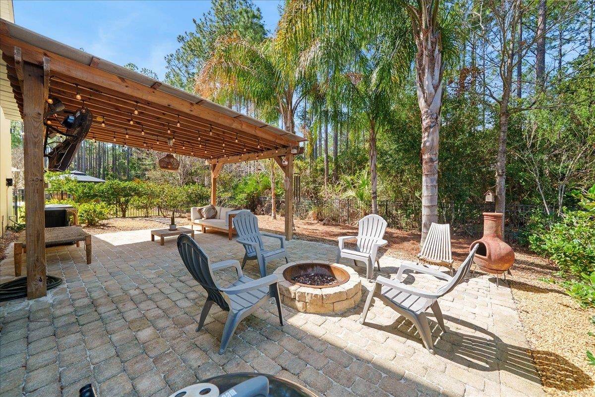 110 Ceja Way St. Augustine, FL 32095 - Photo 36 of 78 a view of backyard with outdoor seating a patio and plants