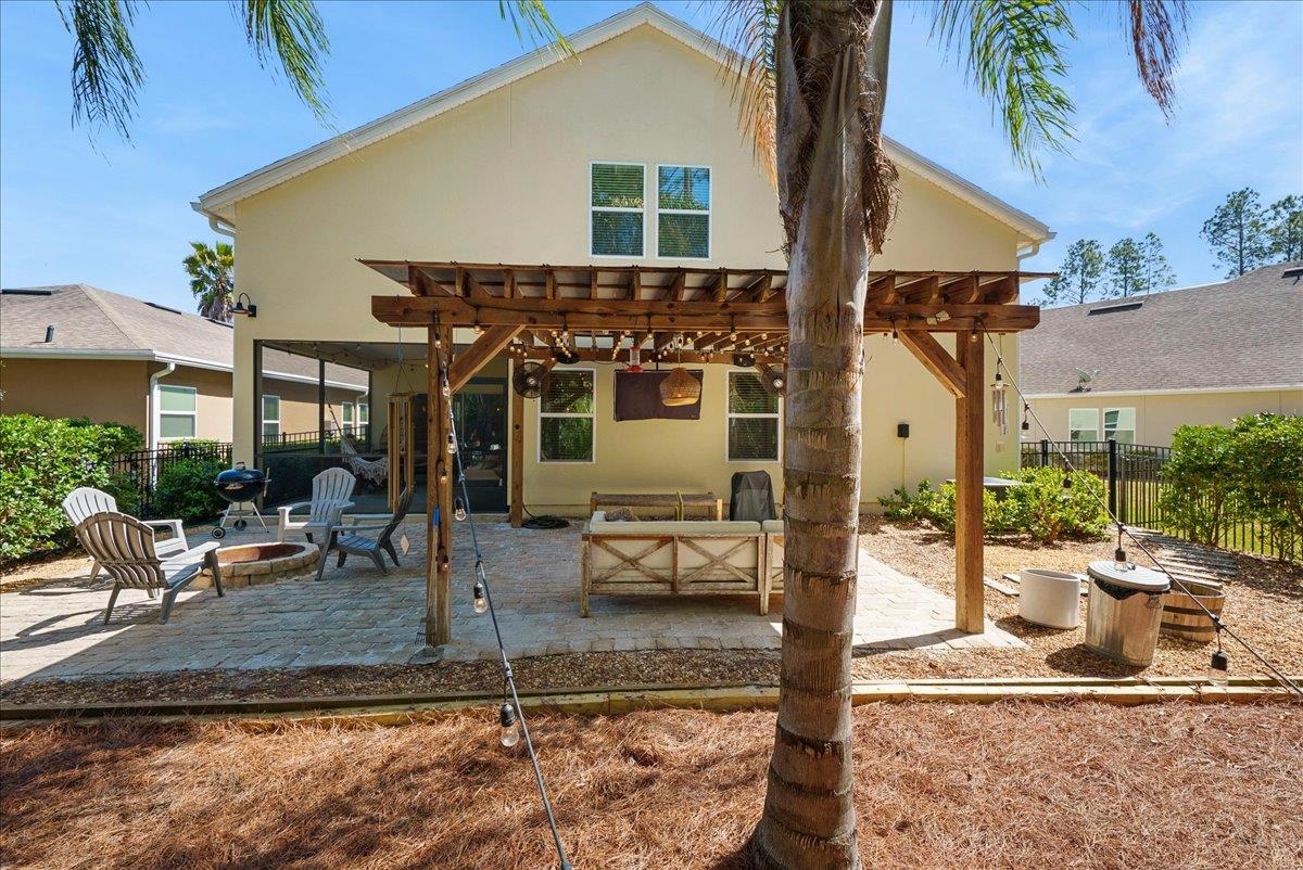 110 Ceja Way St. Augustine, FL 32095 - Photo 40 of 78 a view of a house with backyard and porch
