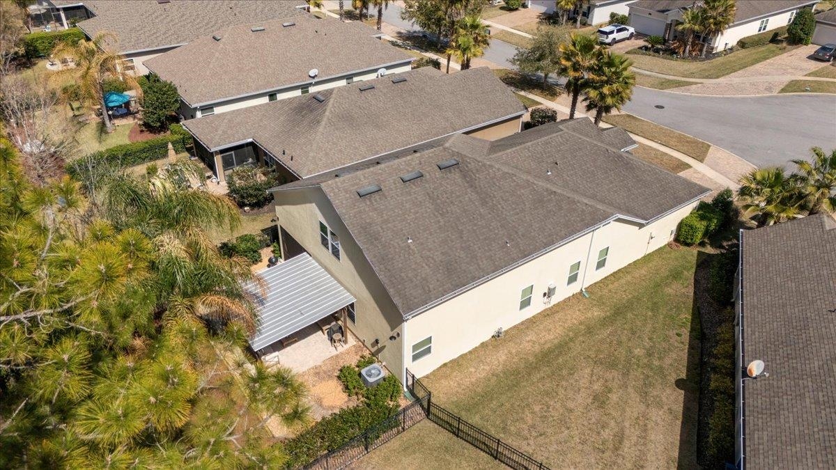 110 Ceja Way St. Augustine, FL 32095 - Photo 44 of 78 an aerial view of a house with a yard and potted plants