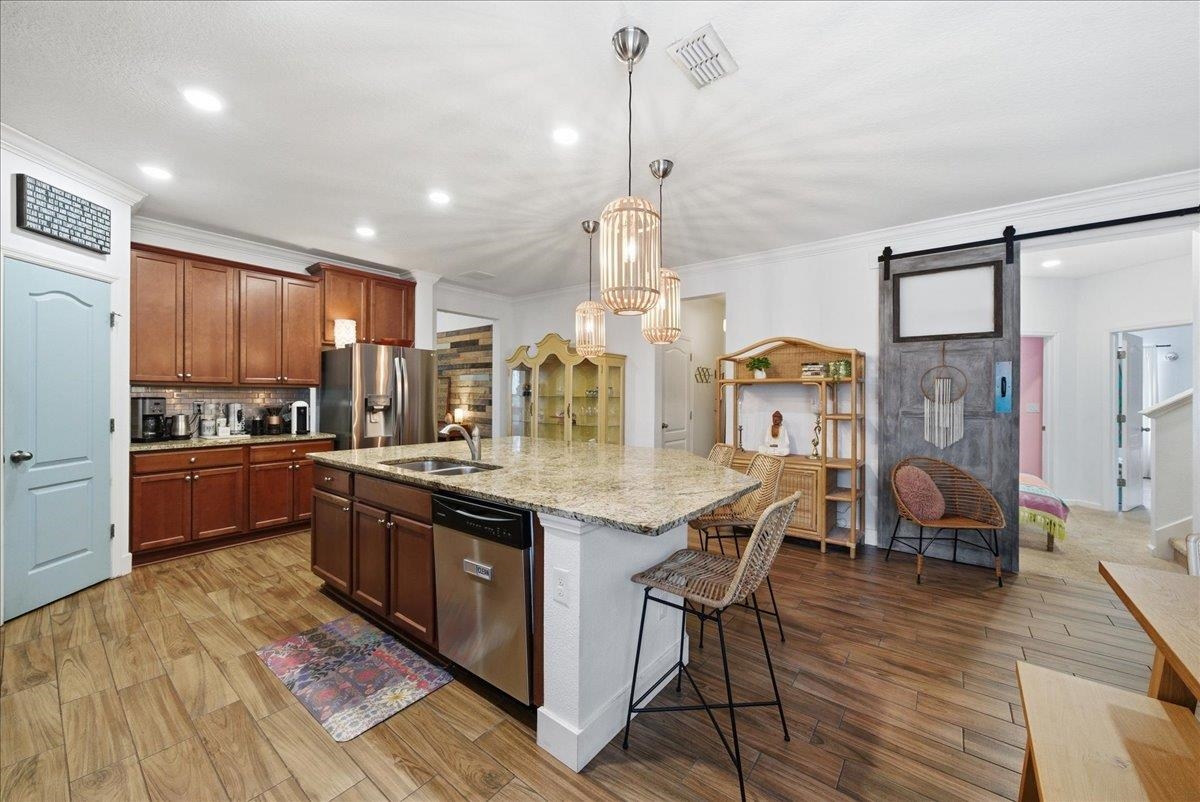 110 Ceja Way St. Augustine, FL 32095 - Photo 7 of 78 a kitchen with lots of counter top space and stainless steel appliances