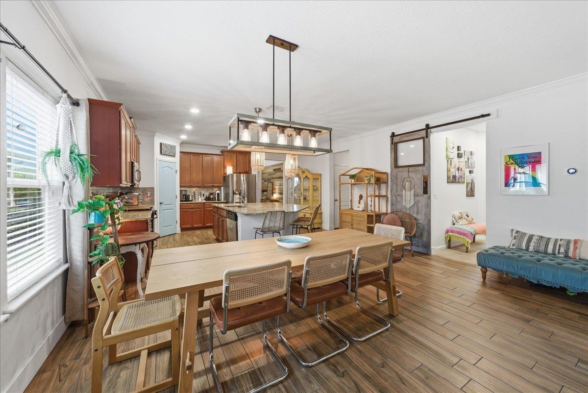 110 Ceja Way St. Augustine, FL 32095 - Photo 10 of 78 a view of a dining room with furniture window and wooden floor
