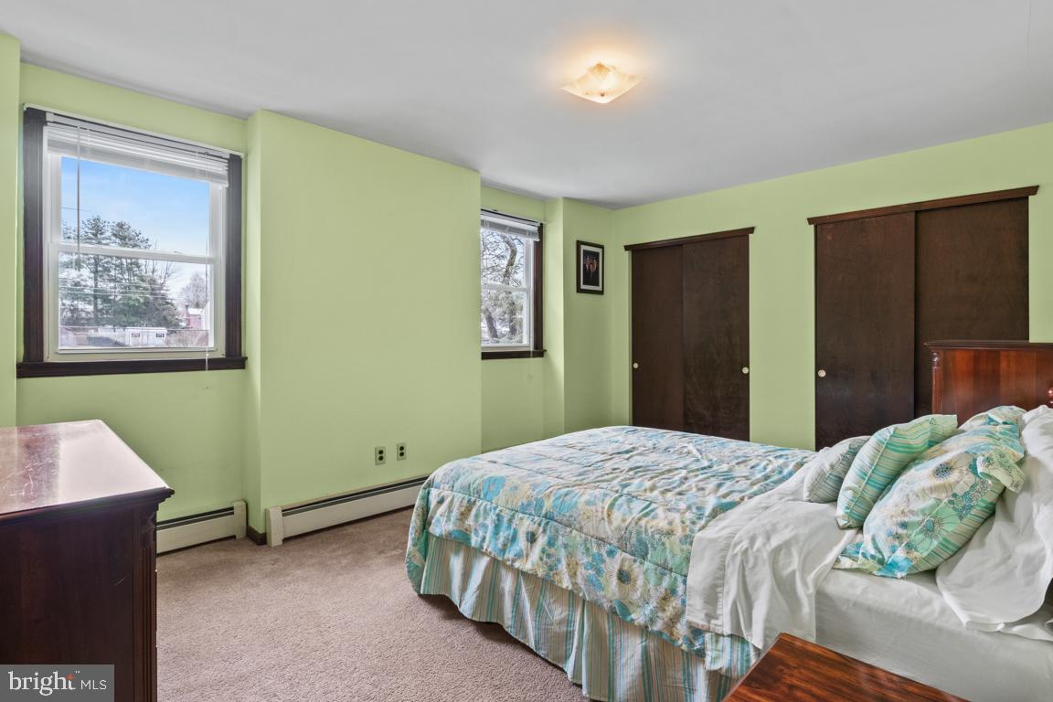 29 Holly Hill Road Richboro, PA 18954 - Photo 27 of 40 a bedroom with a bed and a painting