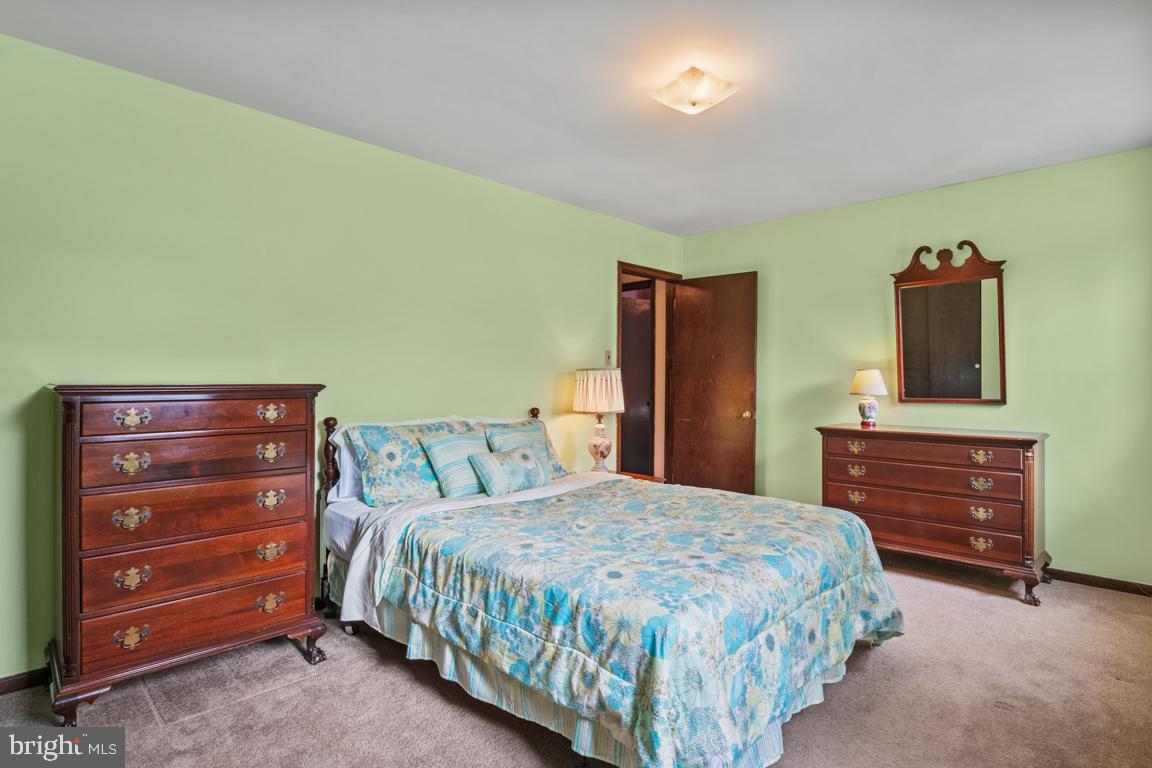 29 Holly Hill Road Richboro, PA 18954 - Photo 28 of 40 a bedroom with a bed and a dresser