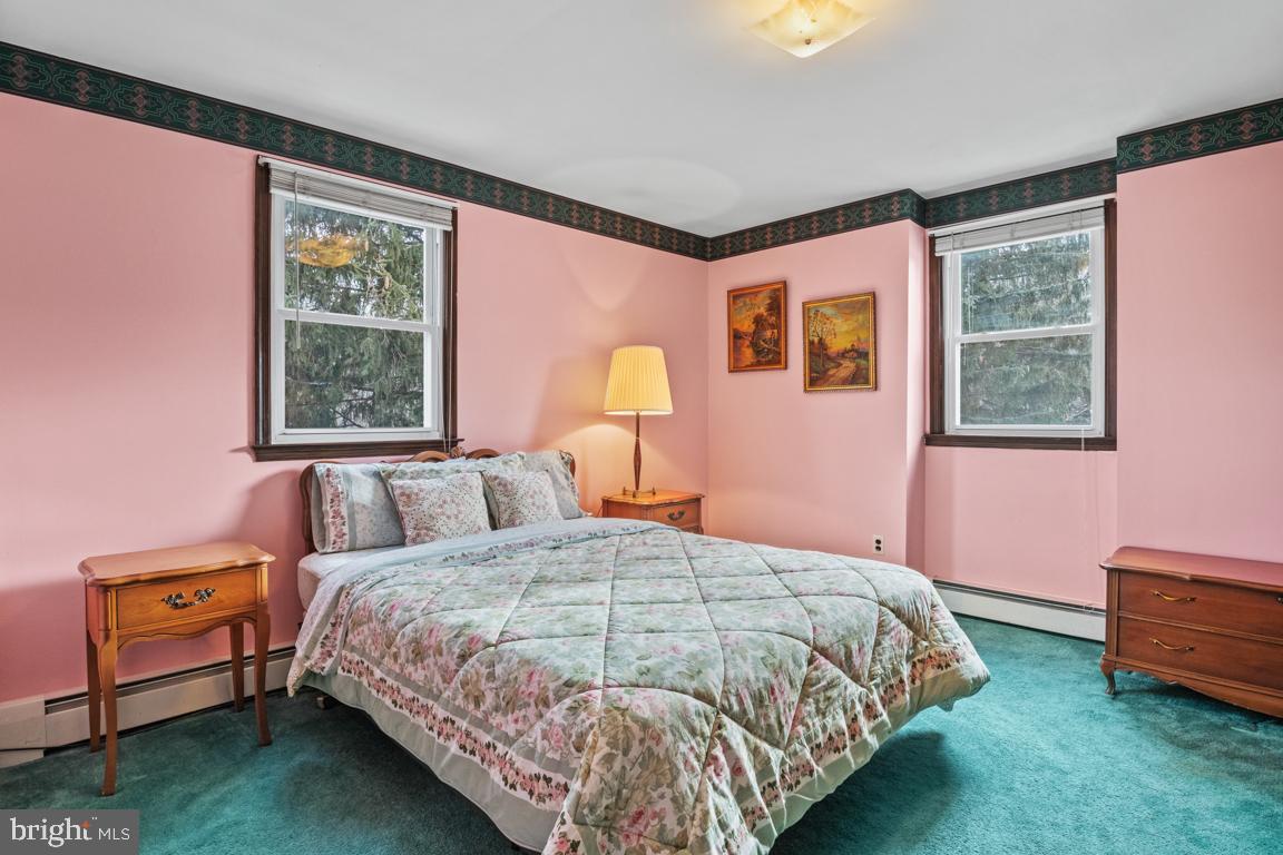 29 Holly Hill Road Richboro, PA 18954 - Photo 29 of 40 a bedroom with a bed and a window