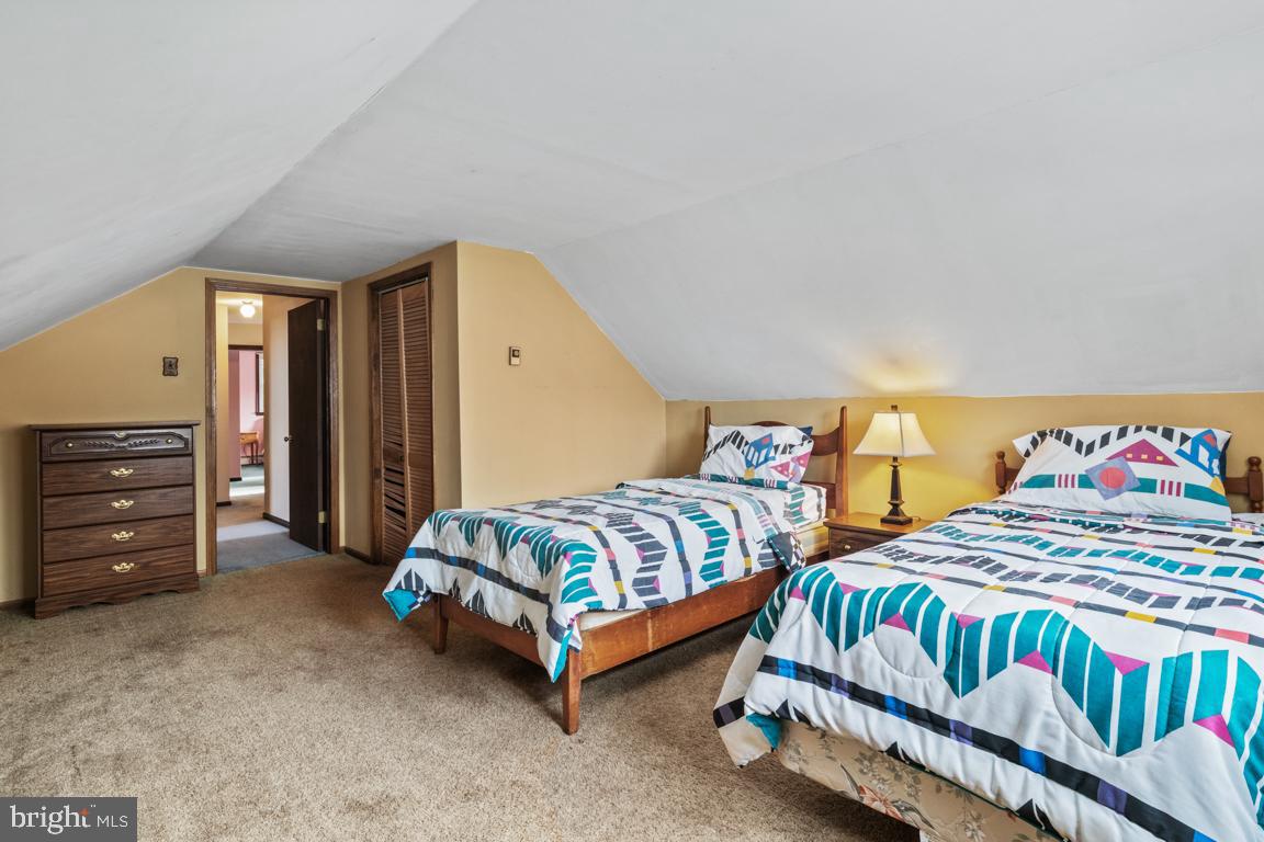 29 Holly Hill Road Richboro, PA 18954 - Photo 32 of 40 a bedroom with two beds and a dresser