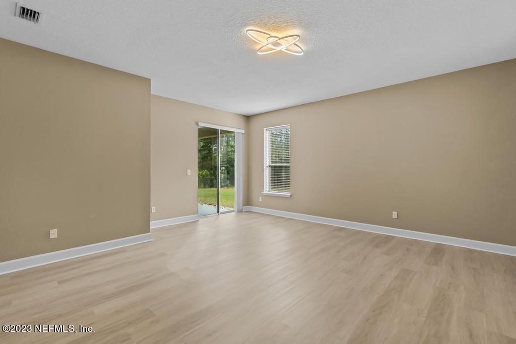 126 Arabian Court St. Augustine, FL 32095 - Photo 14 of 62 a view of an empty room with a window