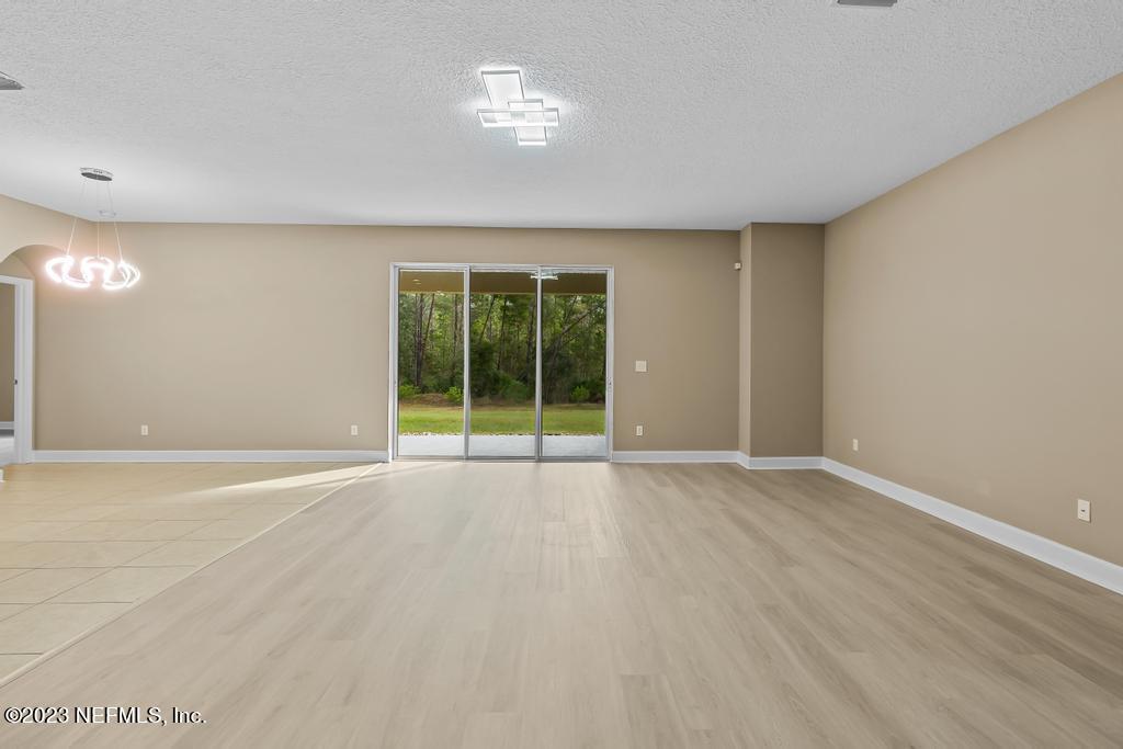 126 Arabian Court St. Augustine, FL 32095 - Photo 19 of 62 a view of an empty room with a window