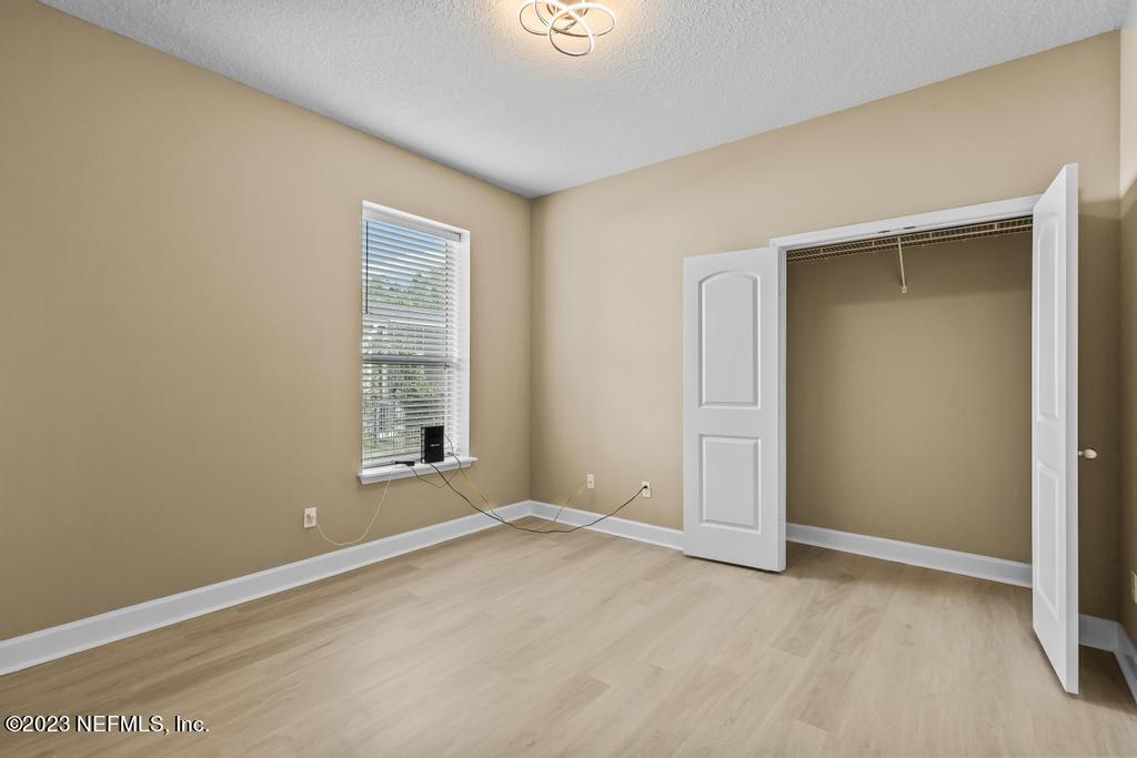 126 Arabian Court St. Augustine, FL 32095 - Photo 23 of 62 an empty room with windows and closet