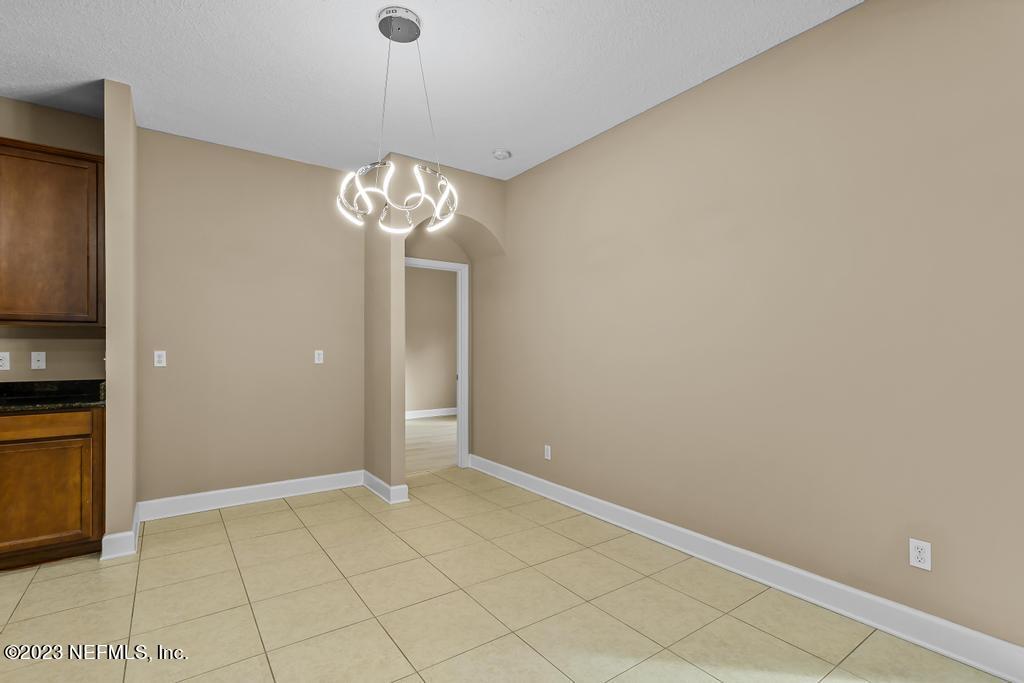 126 Arabian Court St. Augustine, FL 32095 - Photo 39 of 62 a view of a chandelier in big room and chandelier