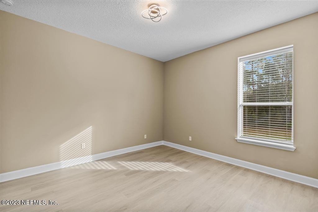 126 Arabian Court St. Augustine, FL 32095 - Photo 48 of 62 a view of an empty room with a window