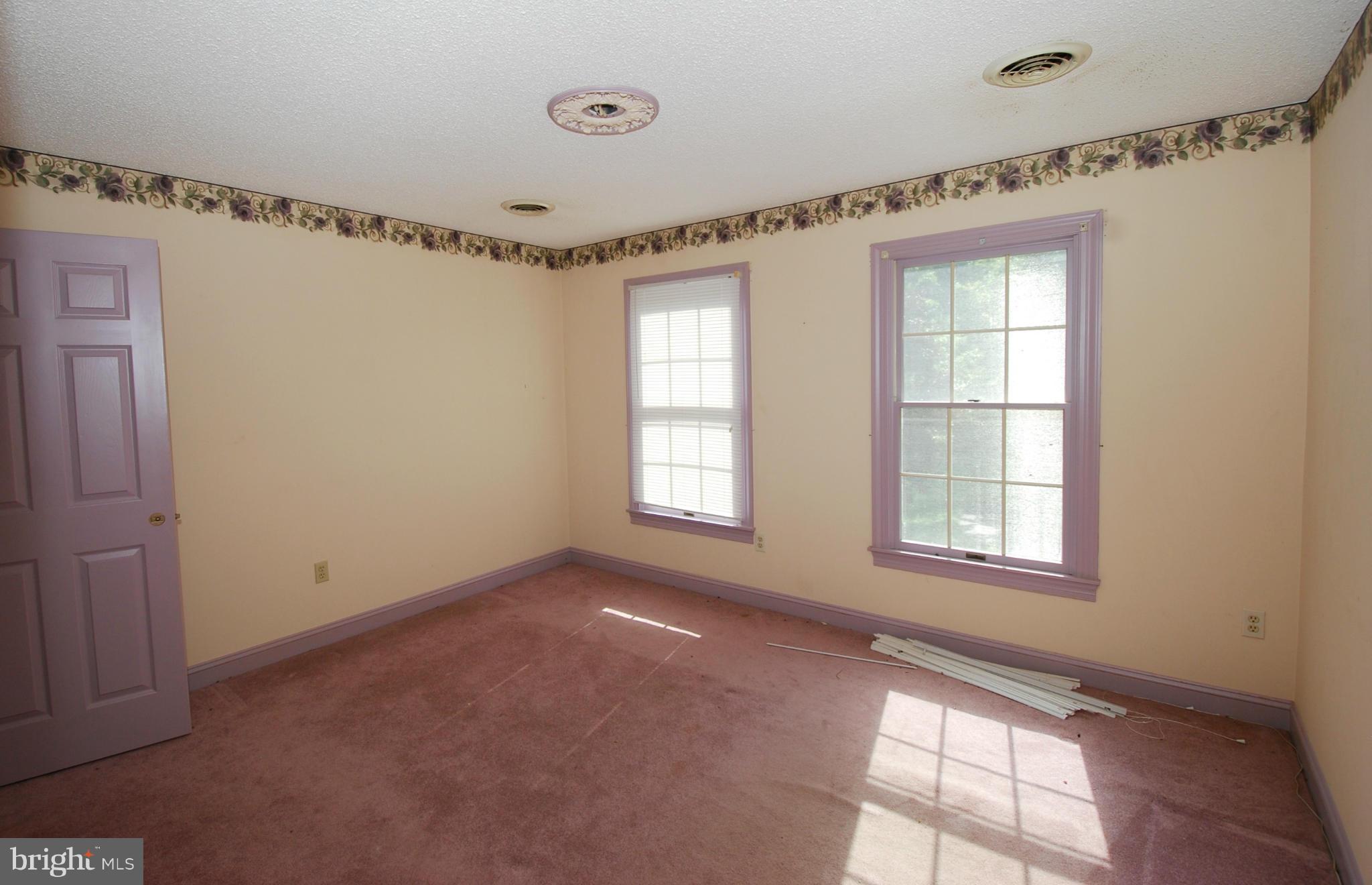 7812 Dance Hall Road Frederick, MD 21701 - Photo 22 of 30 a view of an empty room with a window