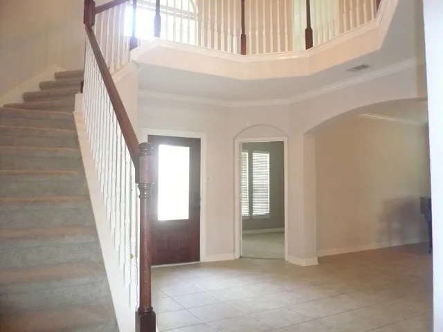 a view of an empty room and window