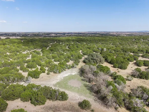 an aerial view of beach and residential space
