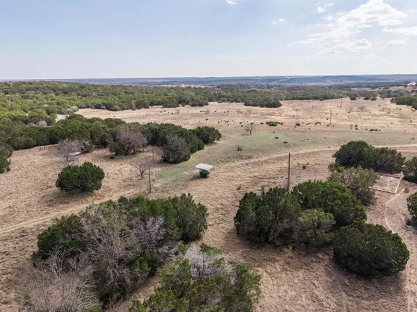 a view of a lake with a city