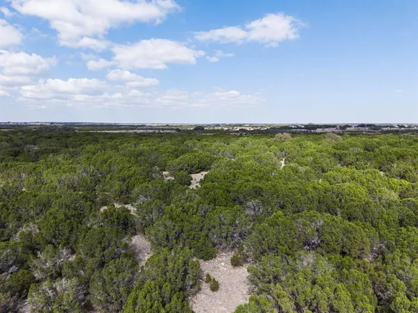 a view of a city with an ocean