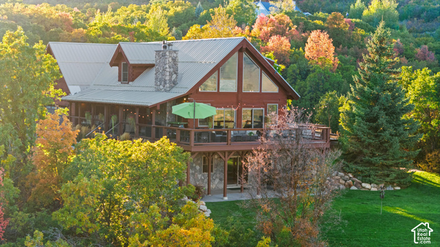5878 Snowbasin Road Huntsville, UT 84317 - Photo 77 of 90 Wood-sided exterior with a metal roof