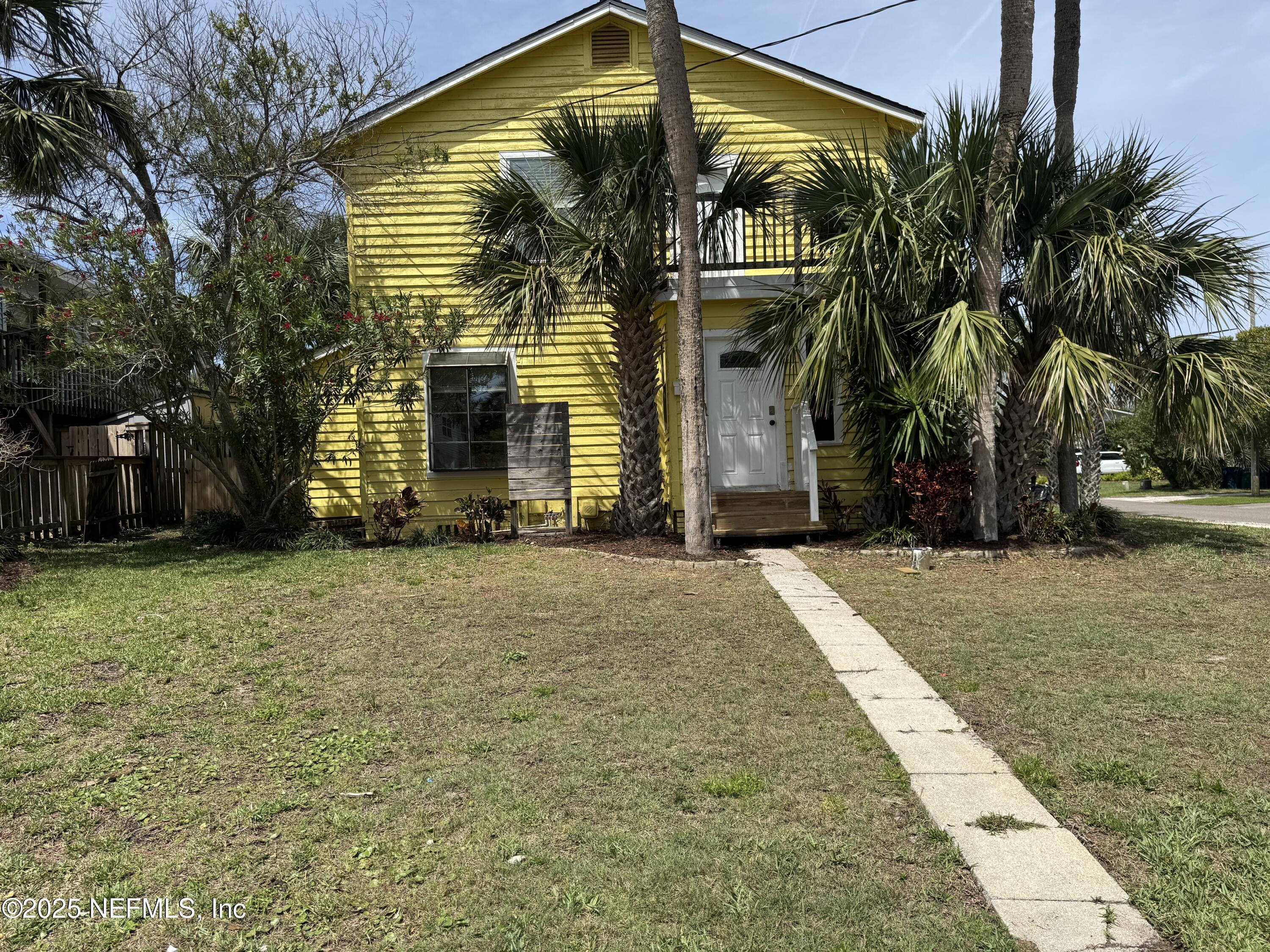 300 Bay Street Neptune Beach, FL 32266 - Photo 2 of 12 a view of a house with a yard