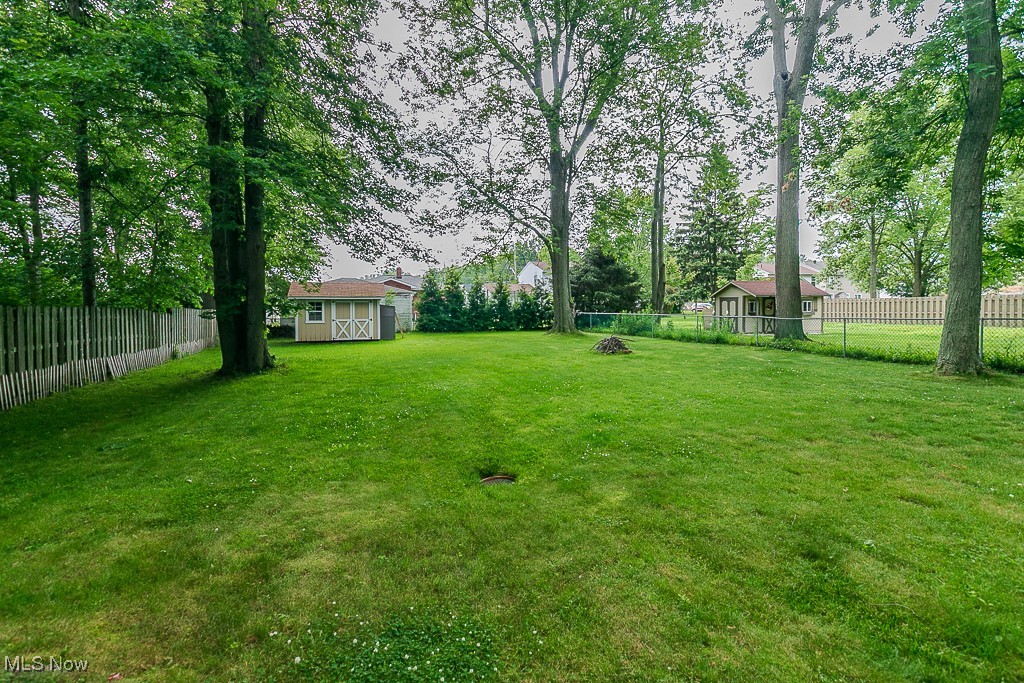 2969 Gale Road Willoughby, OH 44094 - Photo 39 of 46 Fenced backyard featuring a storage shed