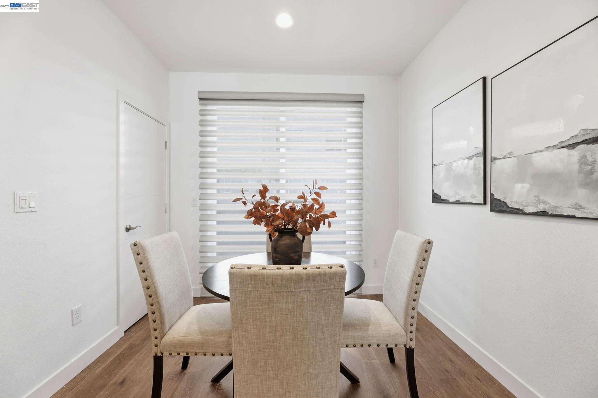 931 Edy Lane Oakland, CA 94607 - Photo 15 of 41 a view of a dining room with furniture window and wooden floor
