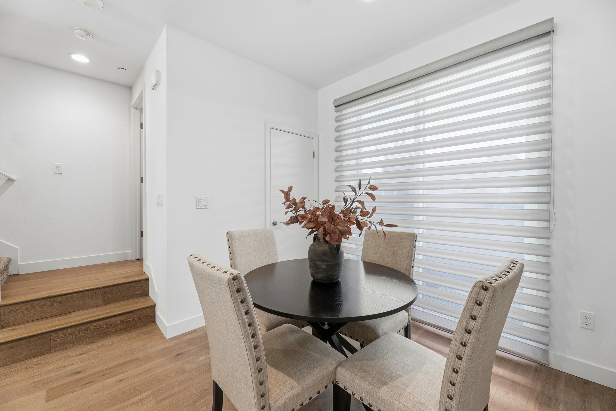 931 Edy Lane Oakland, CA 94607 - Photo 16 of 41 a view of a dining room with furniture and wooden floor