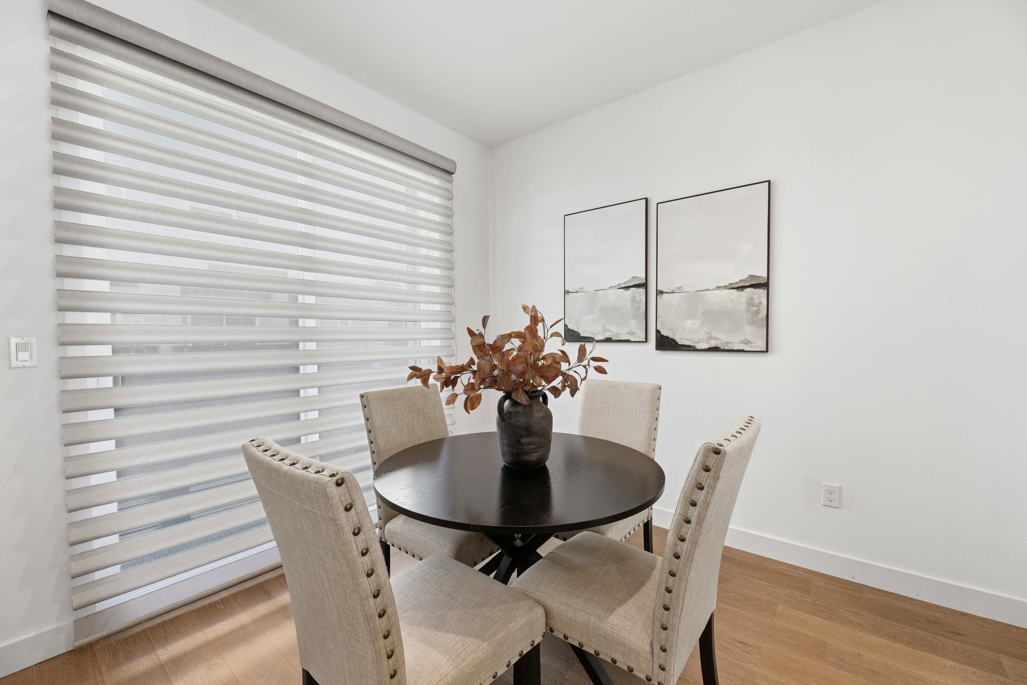 931 Edy Lane Oakland, CA 94607 - Photo 17 of 41 a dining room with furniture and wooden floor
