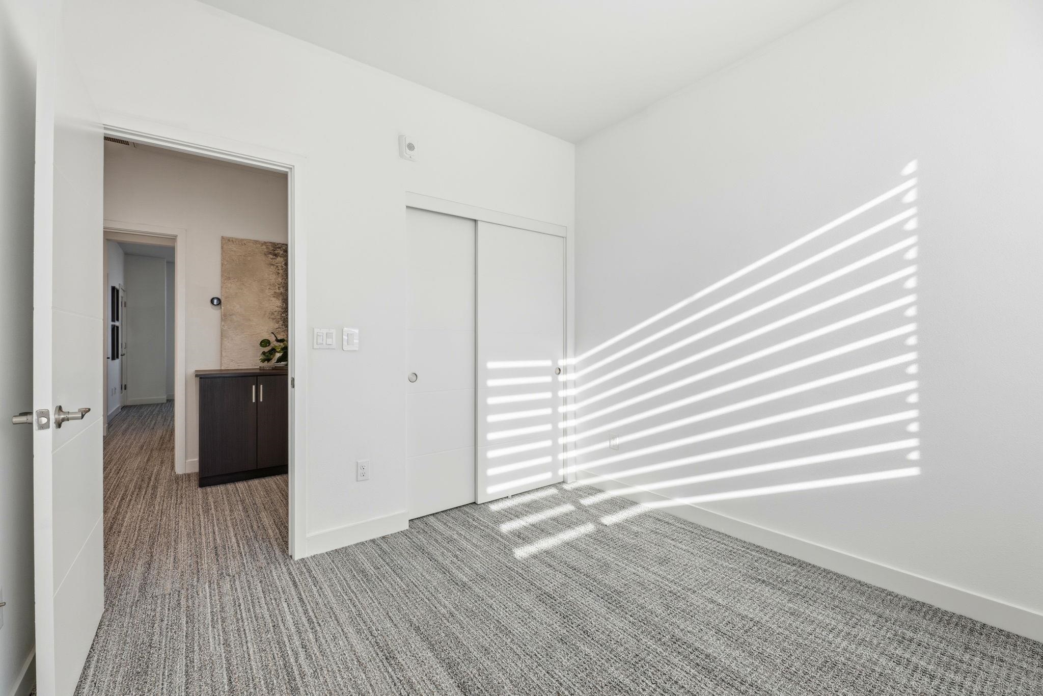 931 Edy Lane Oakland, CA 94607 - Photo 25 of 41 a view of a hallway with wooden floor and closet