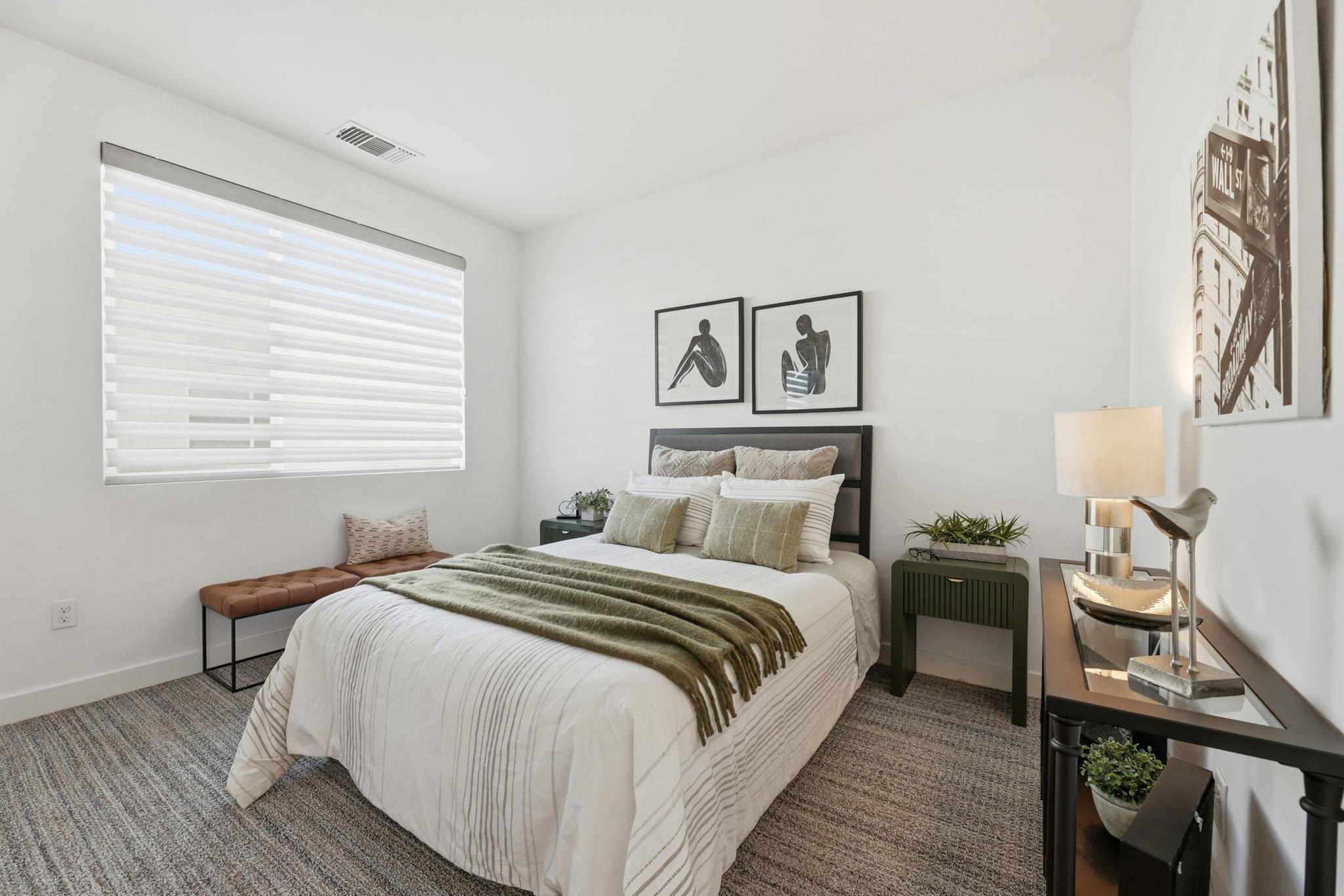 931 Edy Lane Oakland, CA 94607 - Photo 27 of 41 a bedroom with a bed and a window