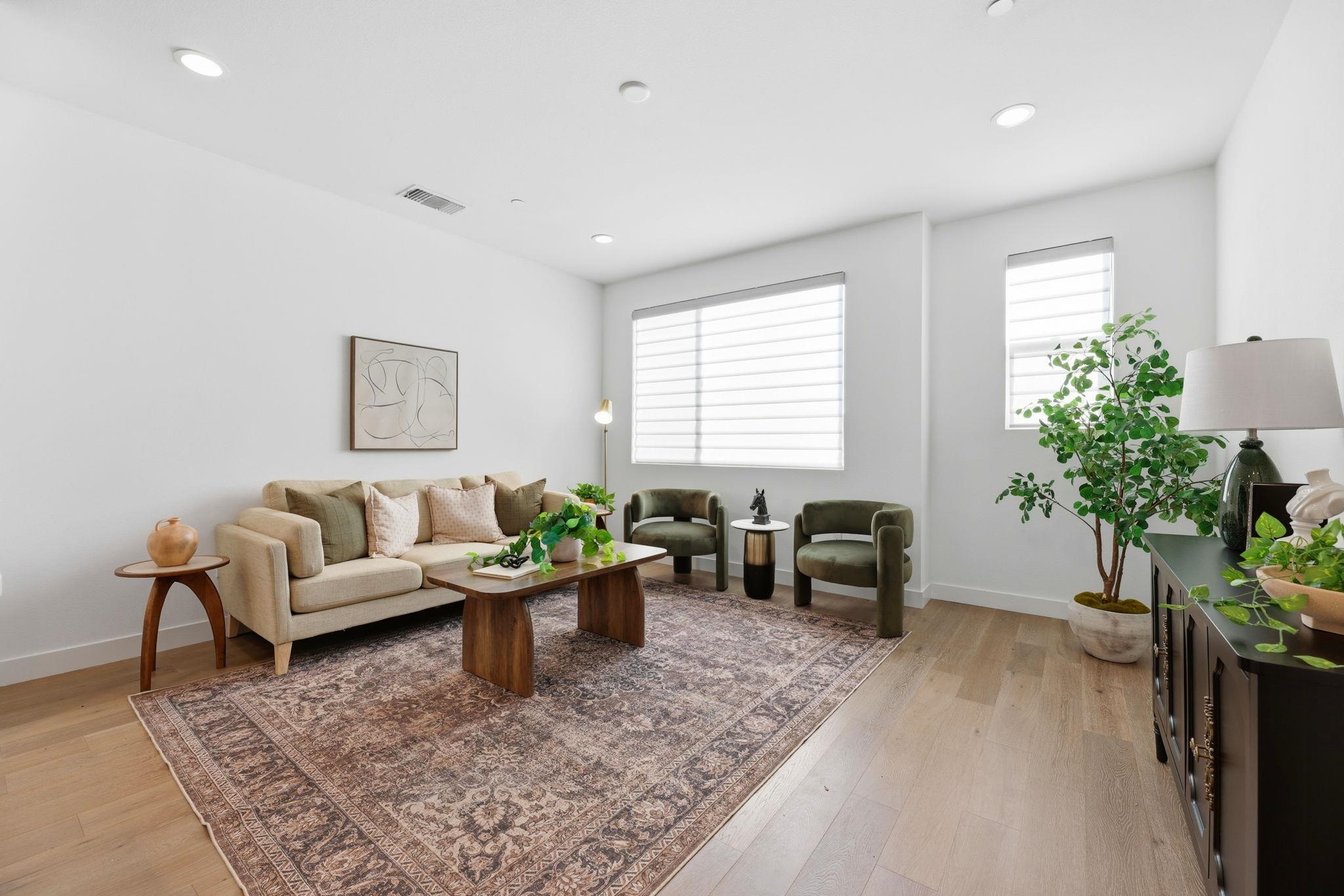 931 Edy Lane Oakland, CA 94607 - Photo 4 of 41 a living room with furniture and a potted plant