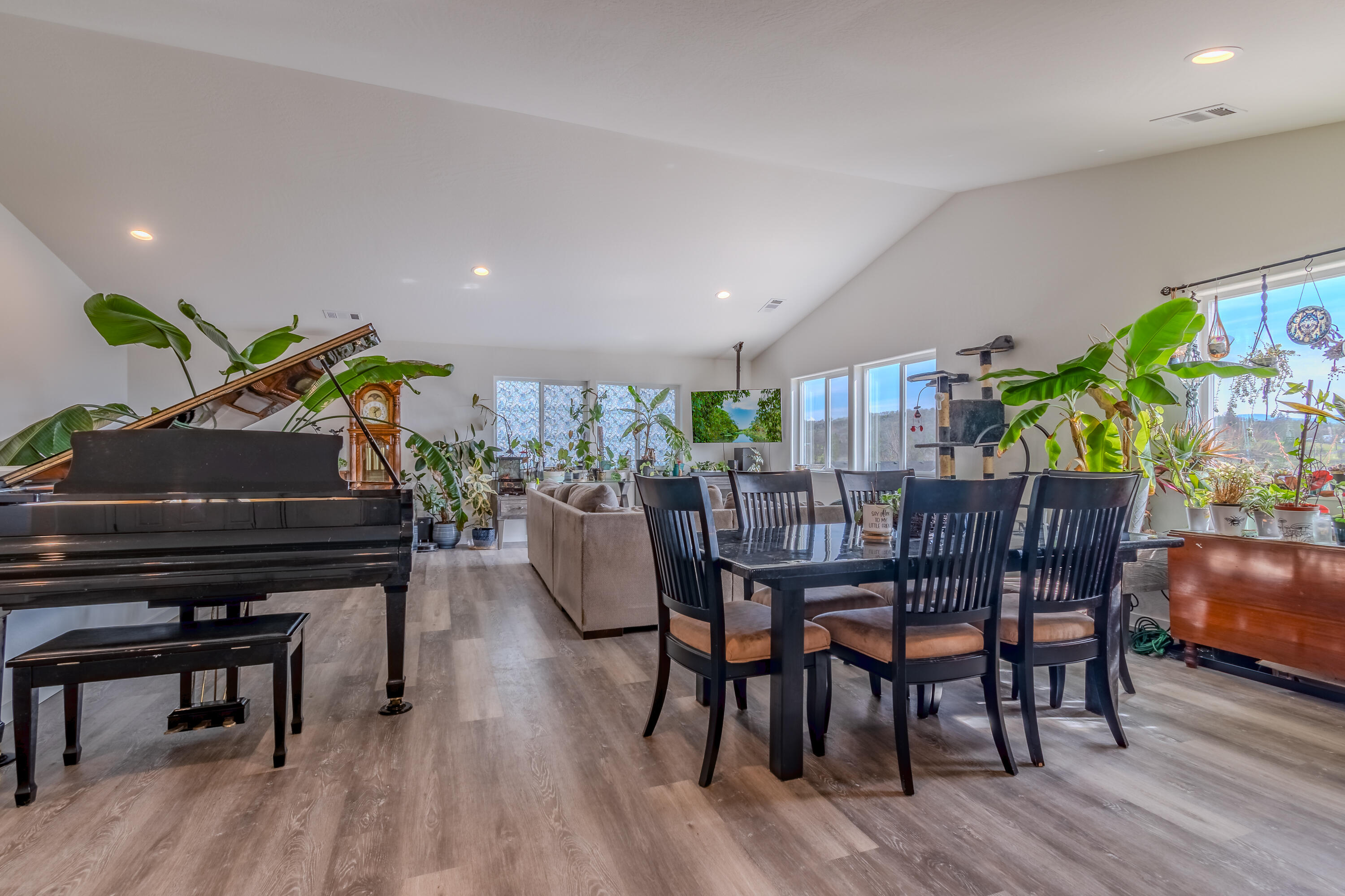 21 Cerulean Terrace Eagle Point, OR 97524 - Photo 2 of 30 a view of a dining room with furniture and wooden floor