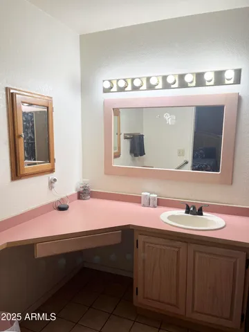 a bed room with a bed and a window