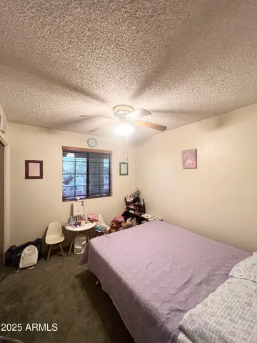 a front view of a house with parking area