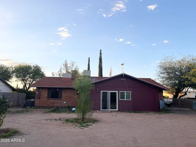 a view of a street with a houses
