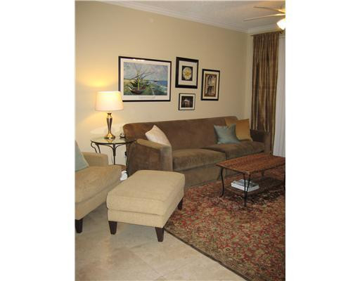 17100 North Bay Road, Unit 1118 Sunny Isles Beach, FL 33160 - Photo 3 of 6 a living room with furniture and a window