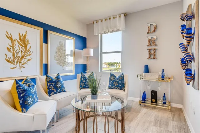 a living room with furniture and a table