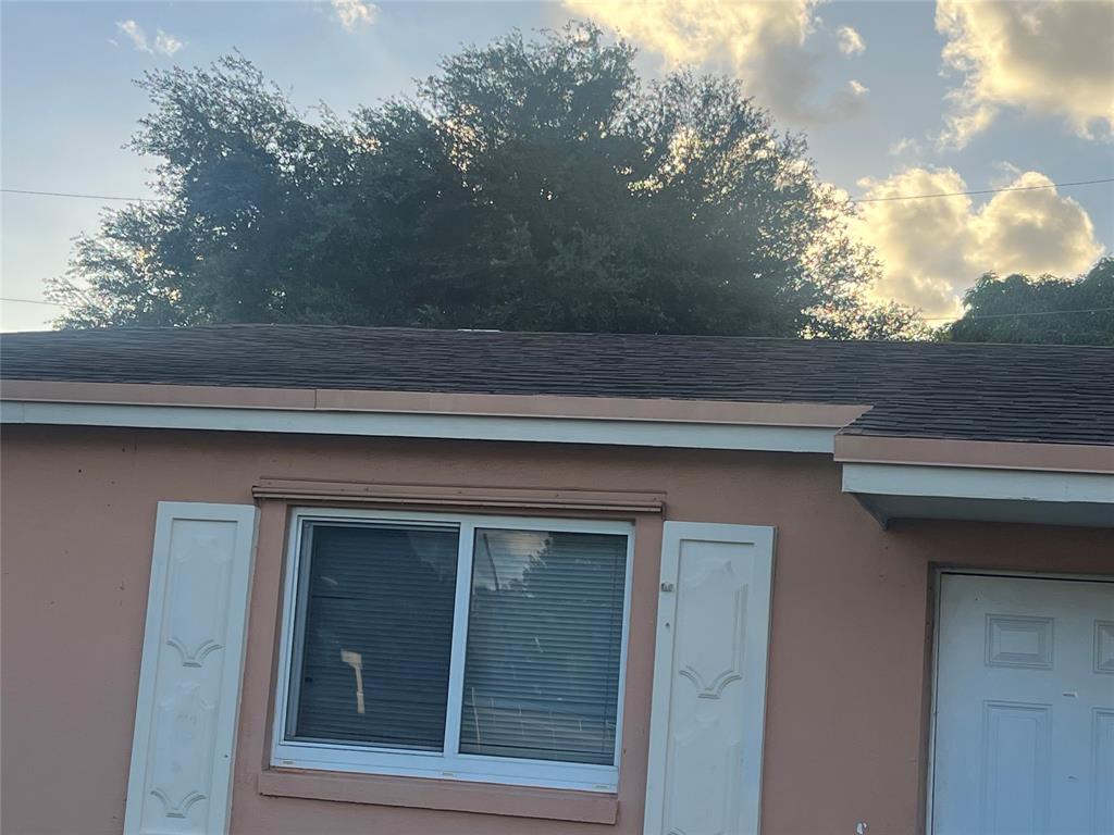 1451 Northwest 33rd Avenue Lauderhill, FL 33311 - Photo 6 of 13 a close view of house with yard