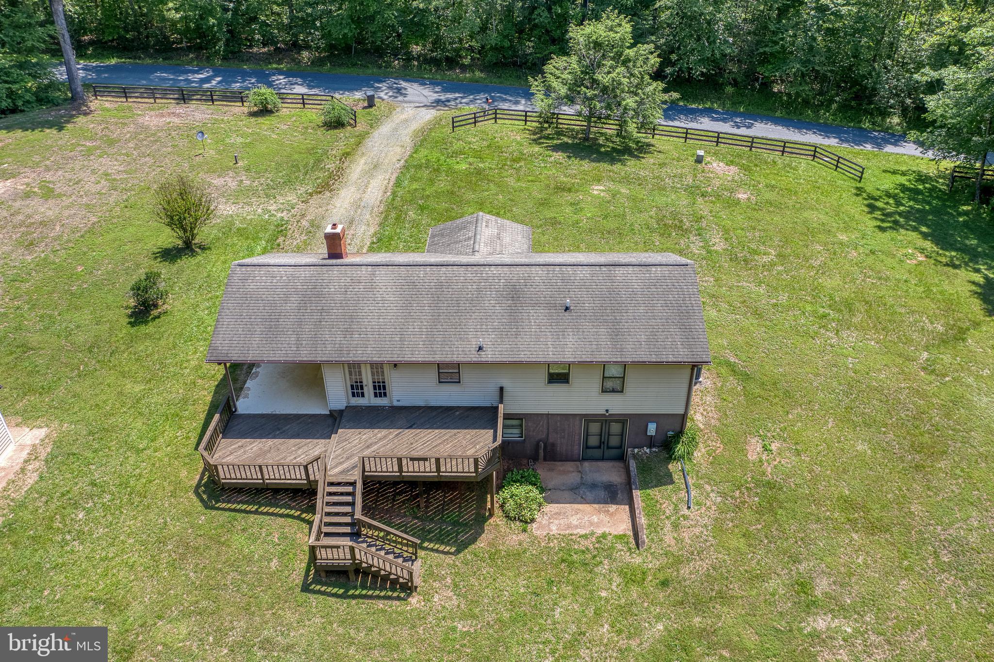 803 Weaver Hollow Road Banco, VA 22711 - Photo 44 of 67 a aerial view of a house with swimming pool and a yard