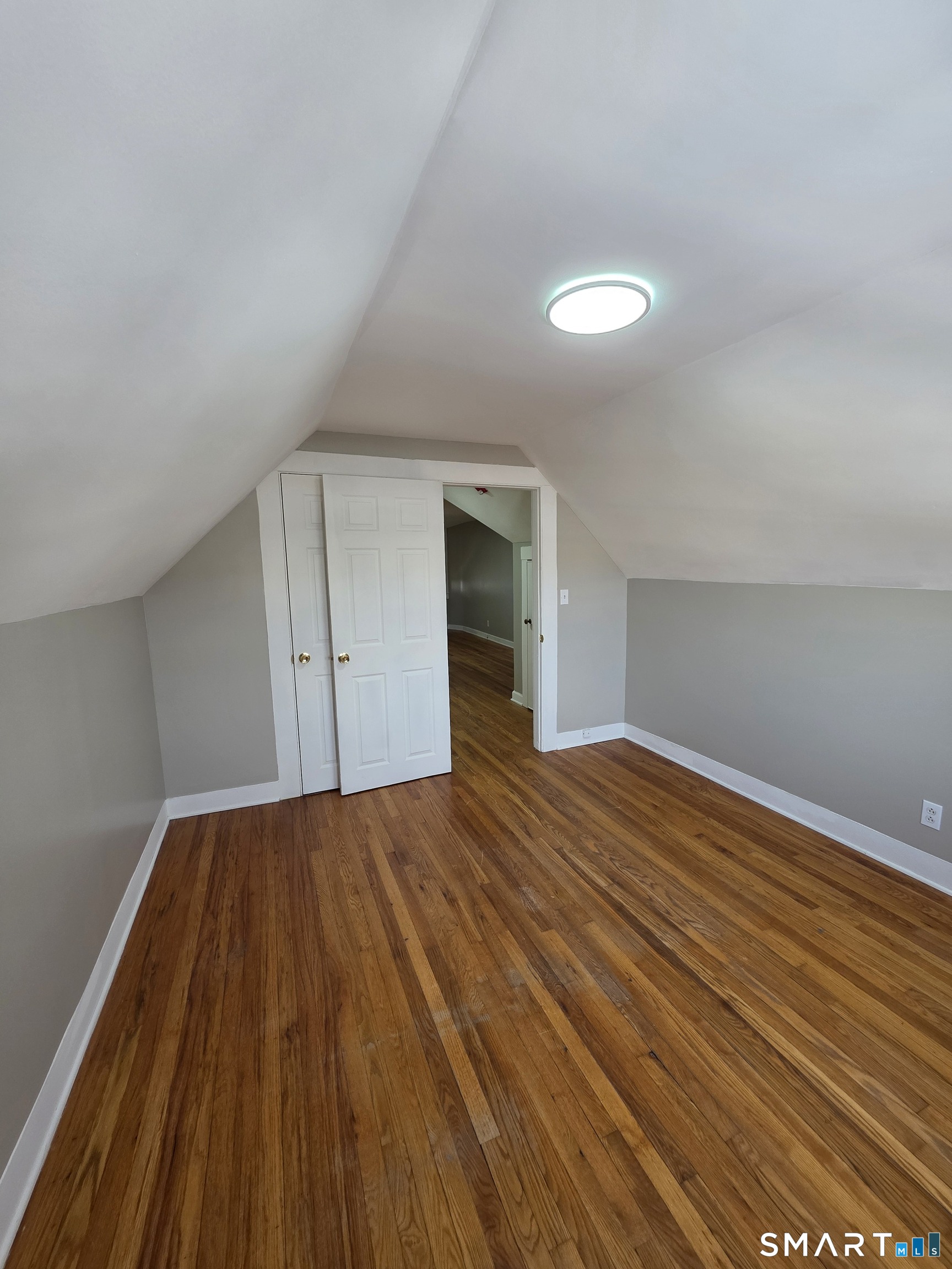 396 West Main Street, Unit 3 New Britain, CT 06052 - Photo 10 of 17 a view of empty room with wooden floor