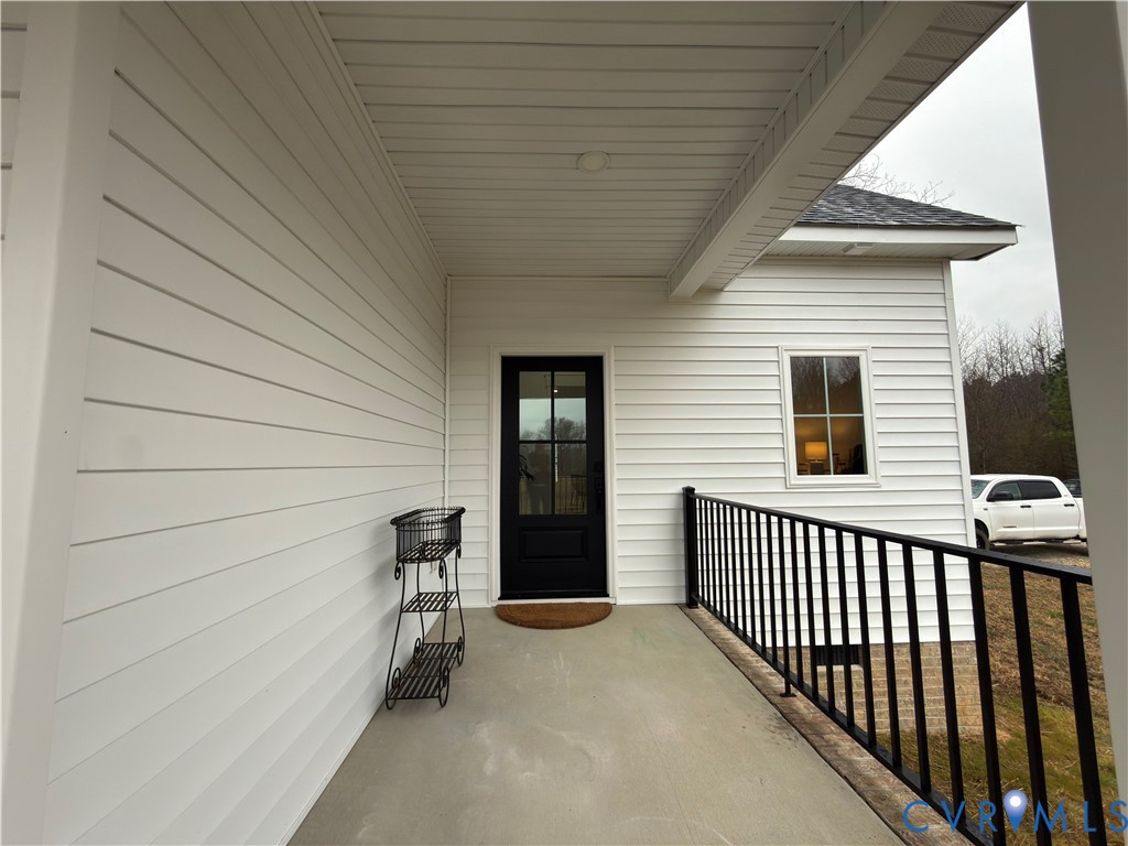 7017 Claiborne Road Sutherland, VA 23885 - Photo 16 of 62 a view of a porch