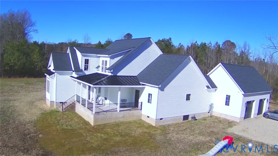 7017 Claiborne Road Sutherland, VA 23885 - Photo 2 of 62 a view of a house with roof deck